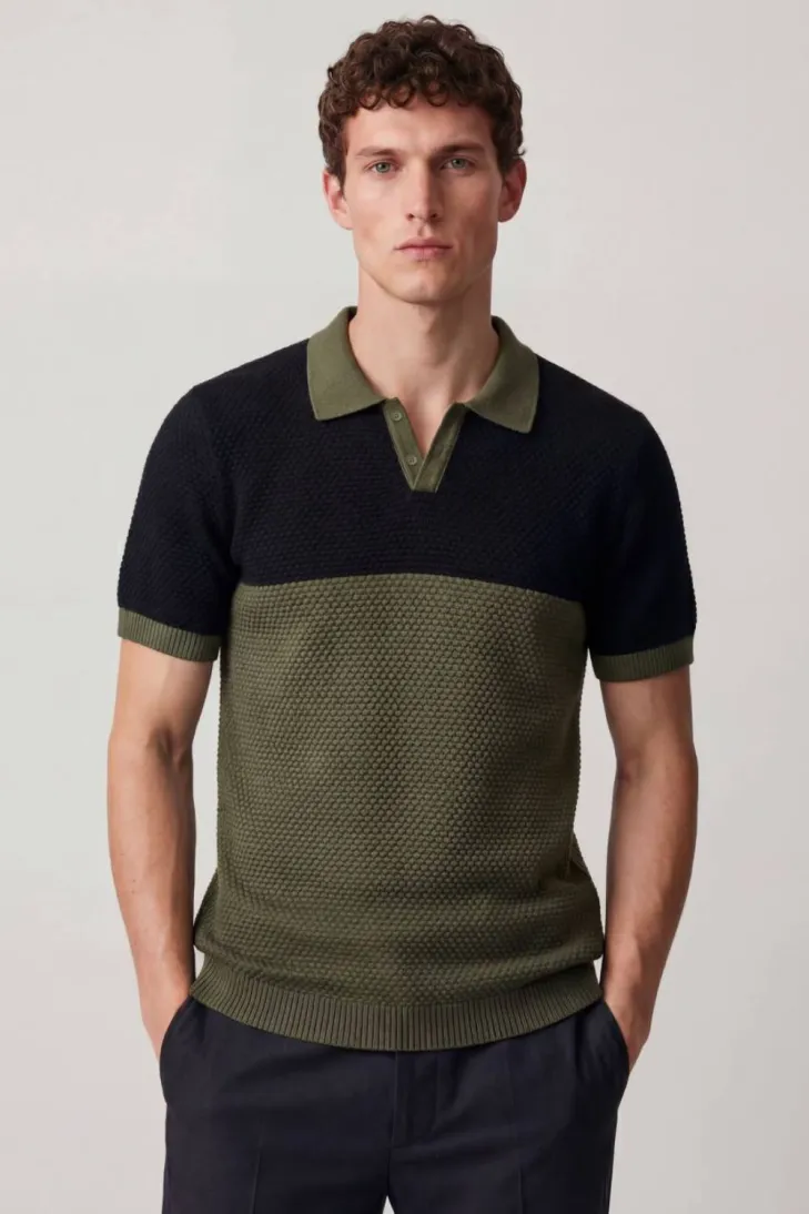 Polo a nido d'ape verde con sprone nero